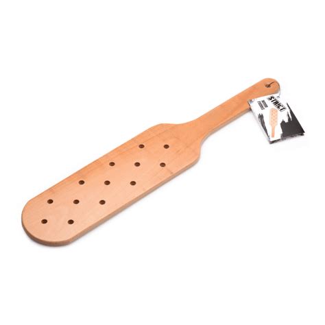 wooden paddle with holes|old school paddle with holes.